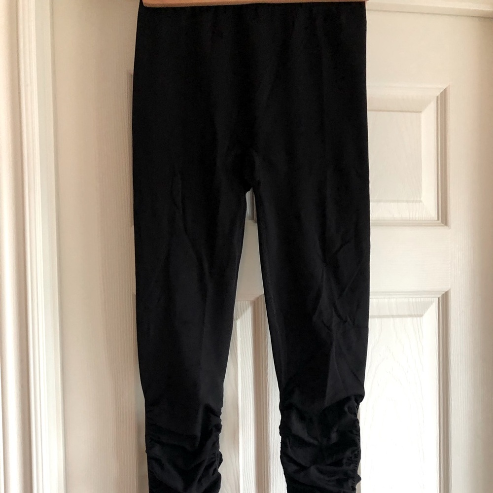 Gapfit. Full length leggings with ruching detail. Size small. Black.